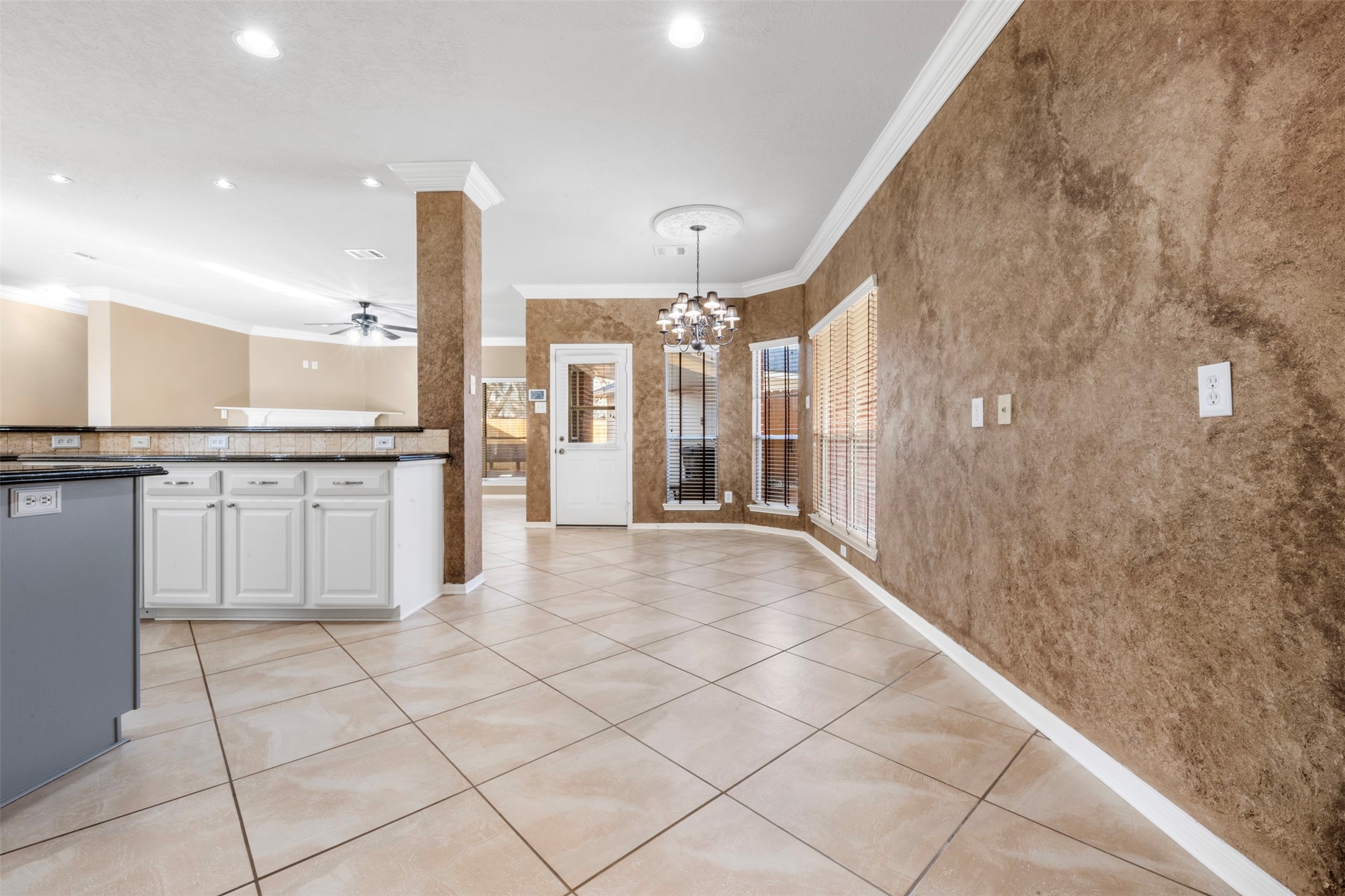 2406 Spanish Oak Hill Court Spring, TX 77388 - Photo 13 of 44 a large white kitchen with a sink and dishwasher a refrigerator with white cabinets