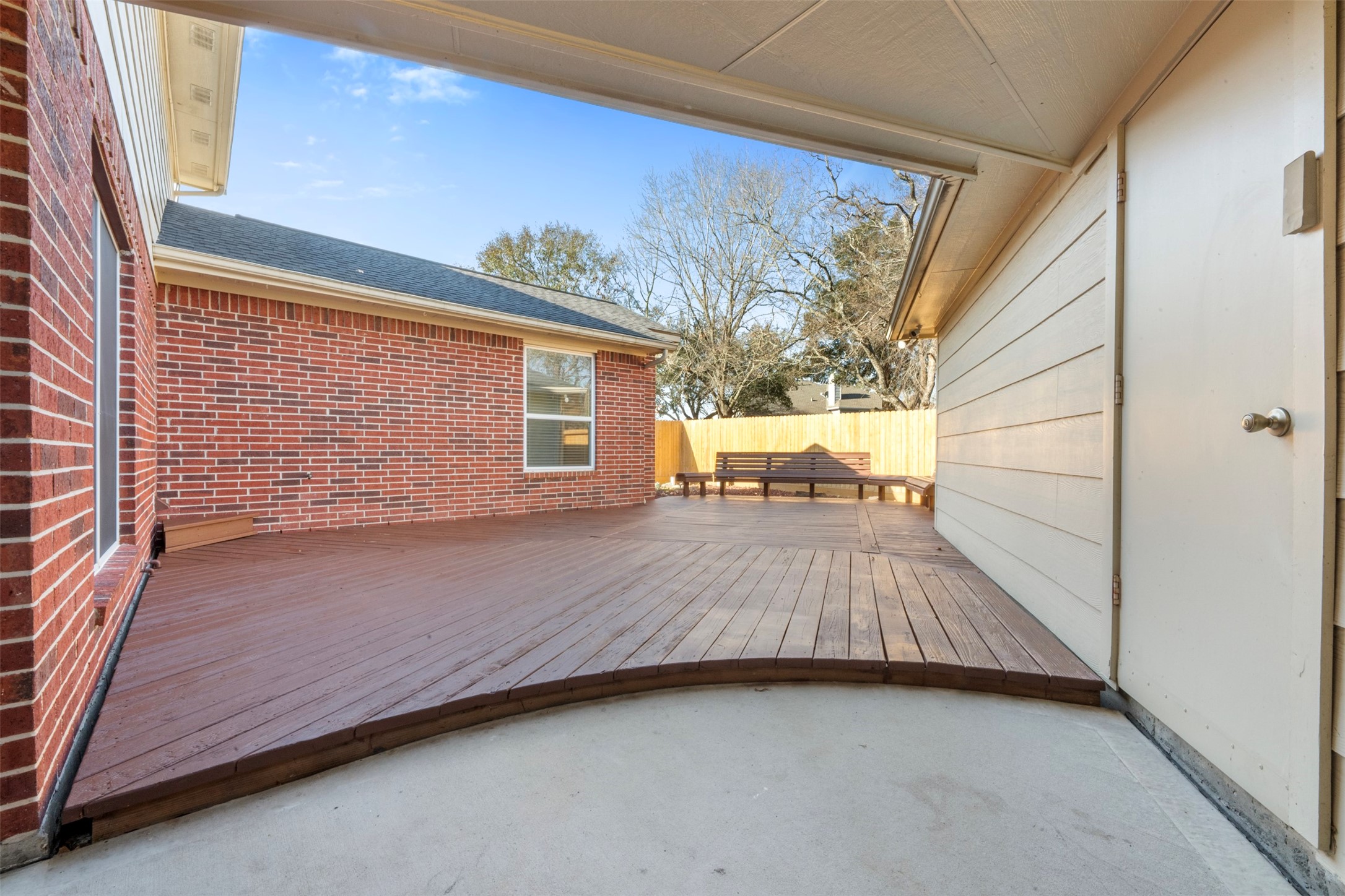 2406 Spanish Oak Hill Court Spring, TX 77388 - Photo 39 of 44 a view of backyard with a large window and wooden floor