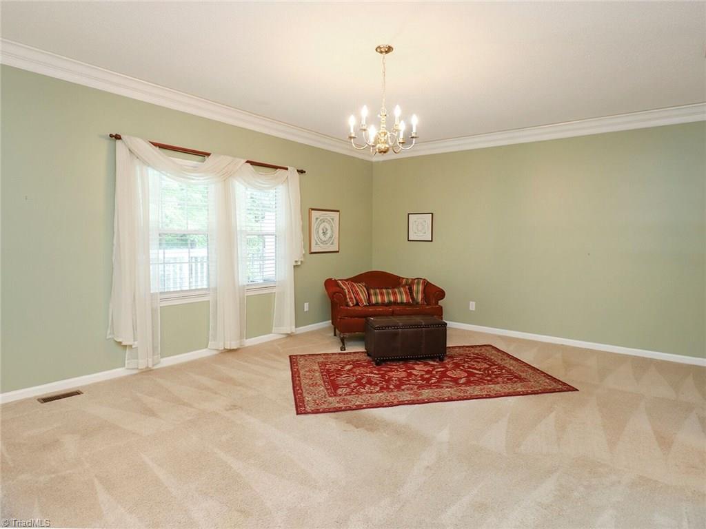 540 Lindley Road Greensboro, NC 27410 - Photo 11 of 29 Very large master bedroom with deep crown molding
