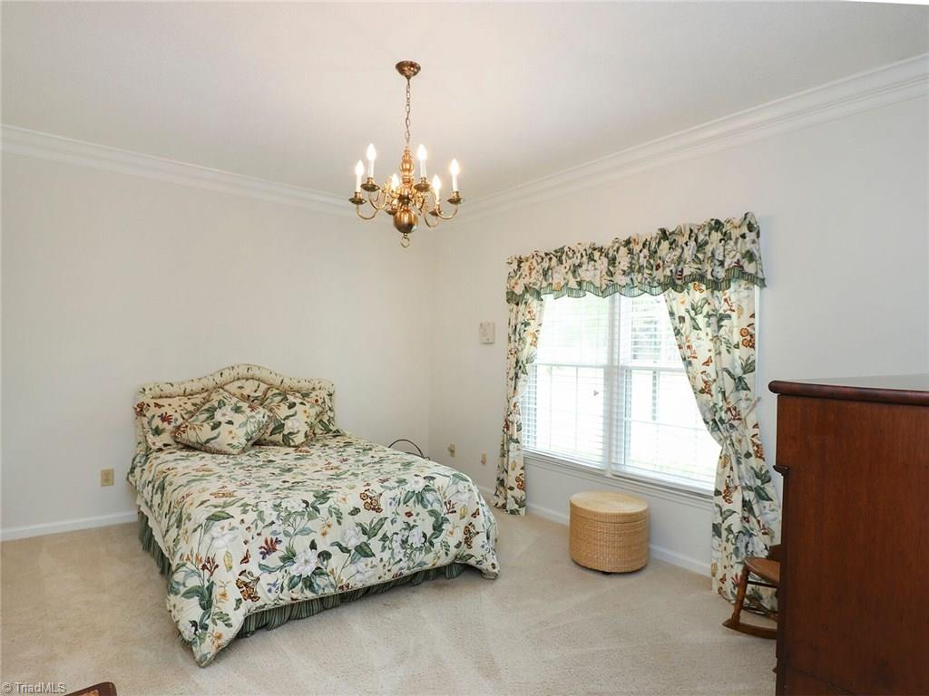540 Lindley Road Greensboro, NC 27410 - Photo 14 of 29 Front bedroom also has deep molding and double window to give lots of natural light.
