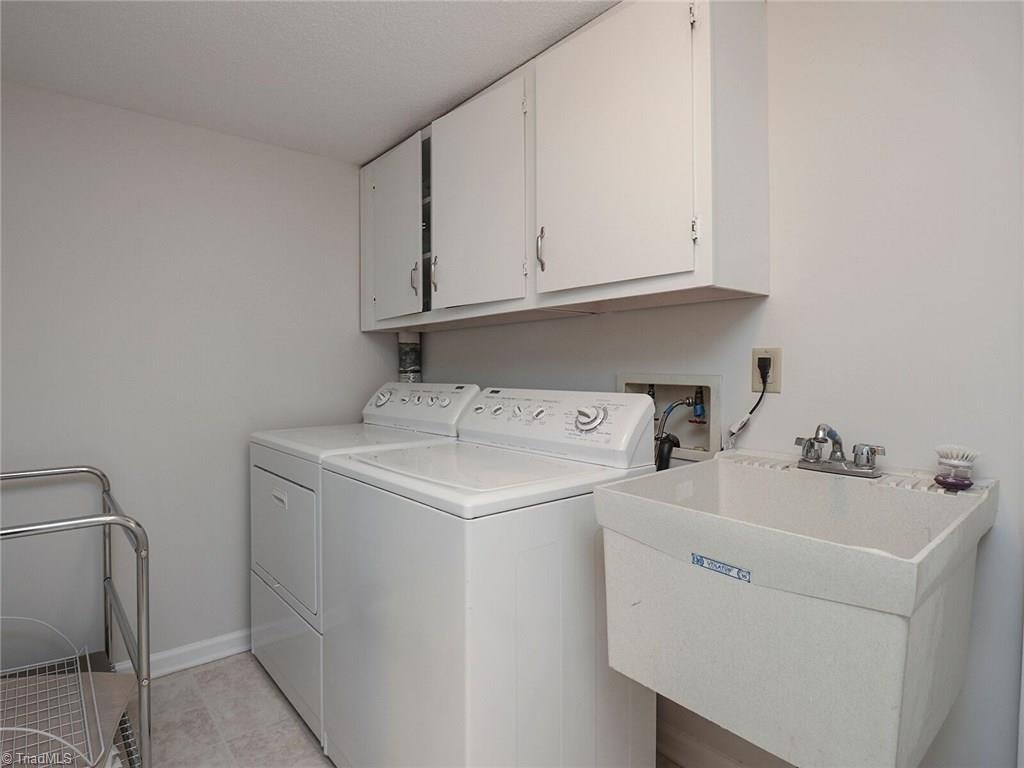540 Lindley Road Greensboro, NC 27410 - Photo 23 of 29 Everyone needs a laundry room and this one even has a laundry tub