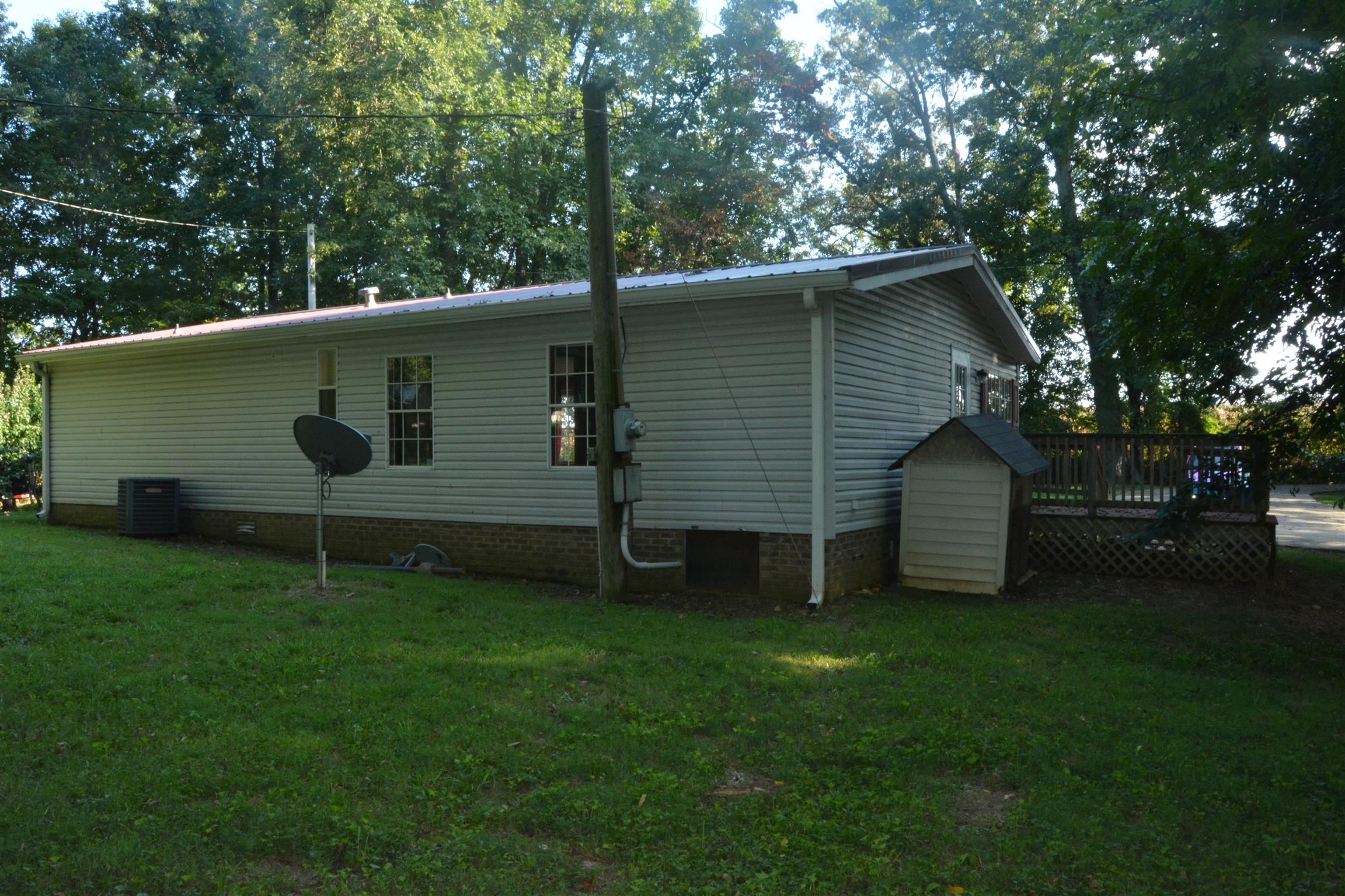 1333 Good Hope Cemetery Road Oak Grove, KY 42262 - Photo 11 of 11 a view of a backyard with a large tree