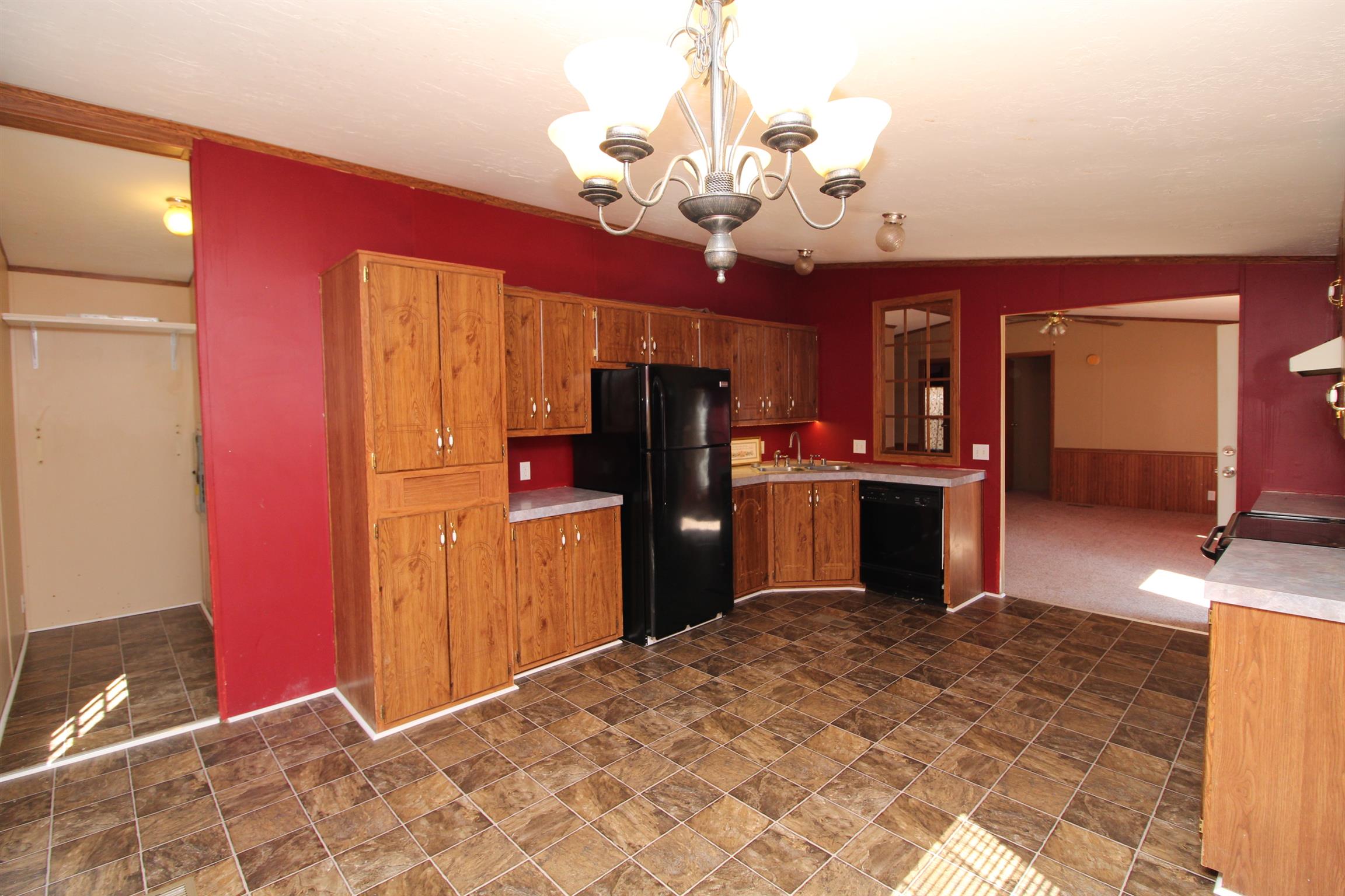 1333 Good Hope Cemetery Road Oak Grove, KY 42262 - Photo 3 of 11 a kitchen view with stainless steel appliances kitchen island granite countertop a refrigerator and a sink