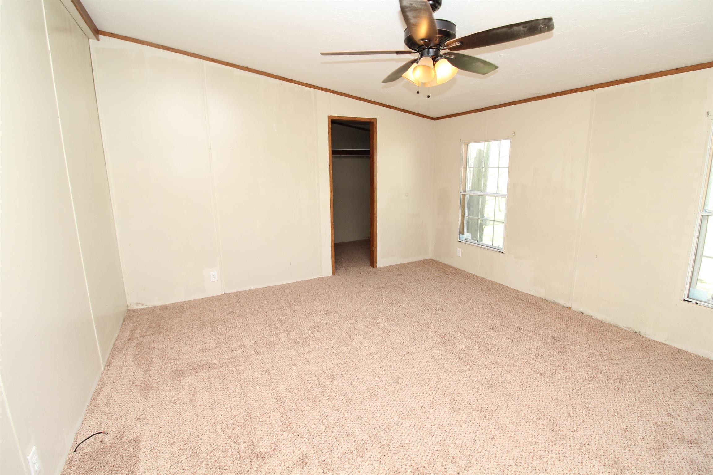1333 Good Hope Cemetery Road Oak Grove, KY 42262 - Photo 5 of 11 a view of an empty room with a window