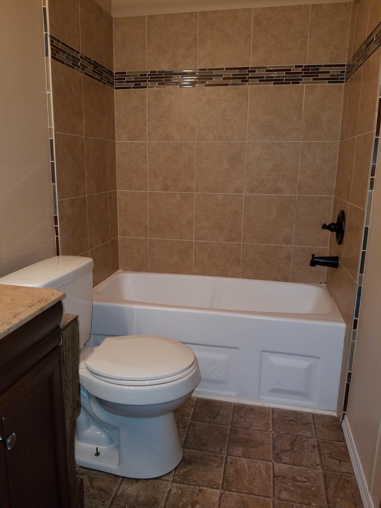 1333 Good Hope Cemetery Road Oak Grove, KY 42262 - Photo 9 of 11 a bathroom with a toilet and a shower