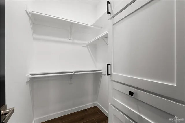 a view of an empty walk in closet