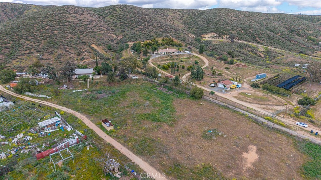 23850 Estelle Mountain Road Perris, CA 92570 - Photo 12 of 23 an aerial view of residential houses with outdoor space