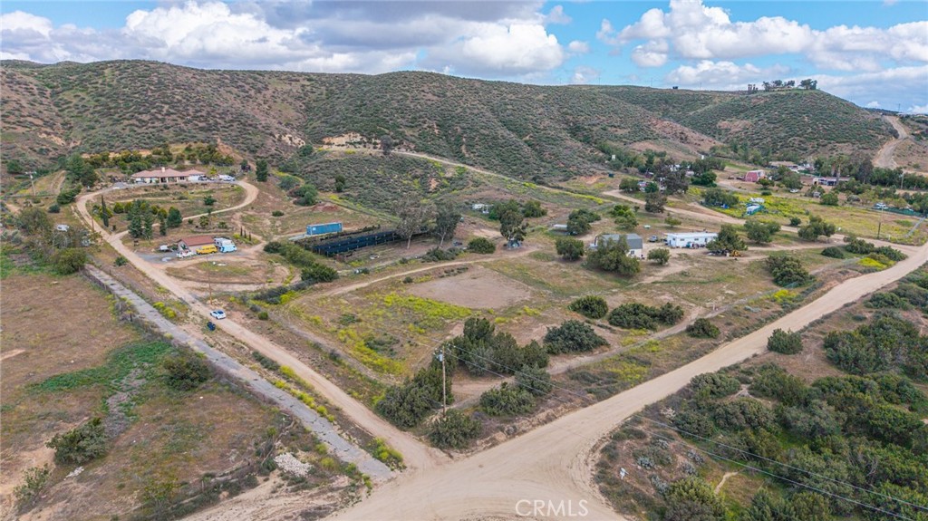 23850 Estelle Mountain Road Perris, CA 92570 - Photo 21 of 23 an aerial view of residential houses with outdoor space
