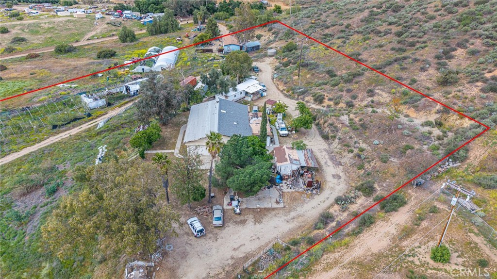 23850 Estelle Mountain Road Perris, CA 92570 - Photo 5 of 23 a backyard of a house with outdoor seating