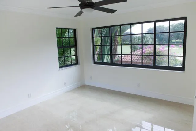 an empty room with windows