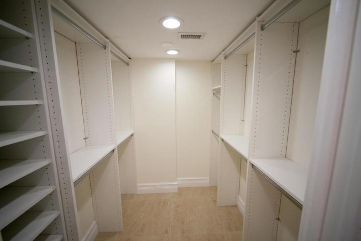 250 East Royal Palm Road, Unit 2A Boca Raton, FL 33432 - Photo 13 of 26 a view of hallway with stairs