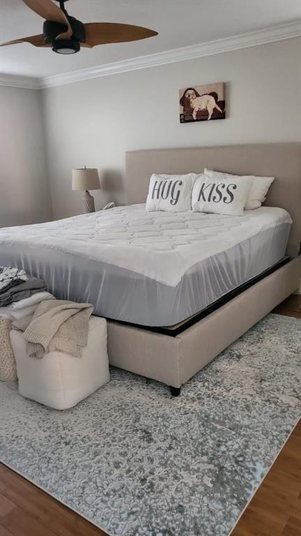 250 East Royal Palm Road, Unit 2A Boca Raton, FL 33432 - Photo 9 of 26 a bedroom with a bed and couch