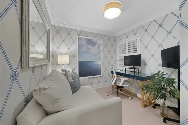 a view of a livingroom with furniture and a flat screen tv