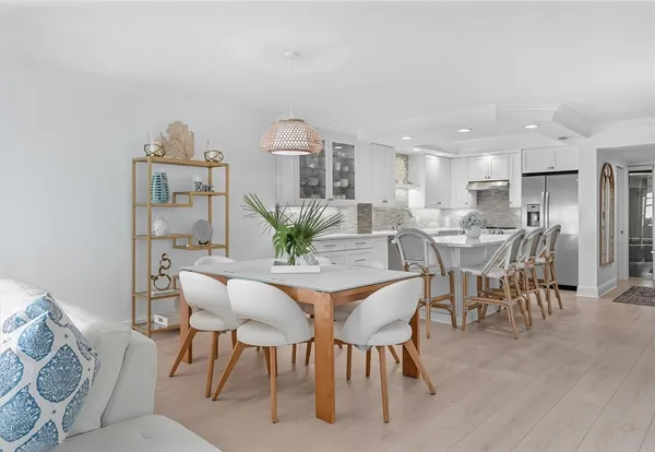 a view of a dining room with furniture