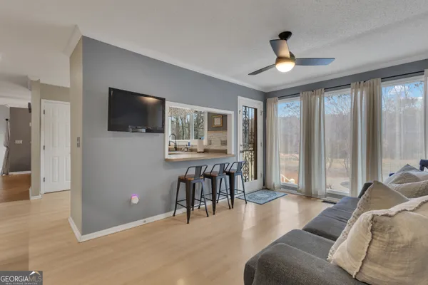 a view of a livingroom with a flat screen tv