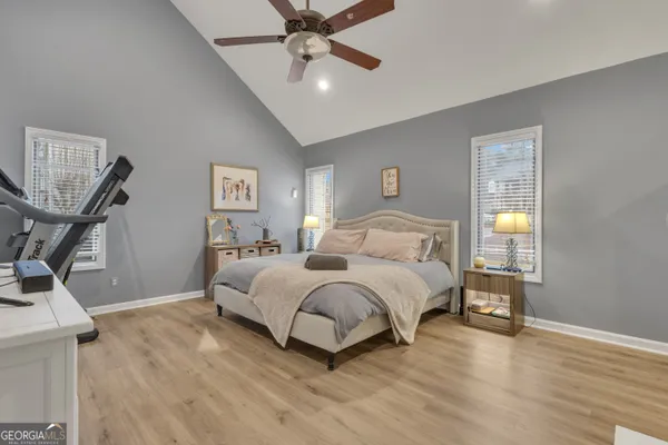 a bedroom with a bed and a view of bedroom