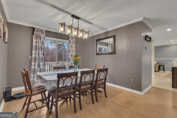 a kitchen with stainless steel appliances granite countertop a stove and a sink