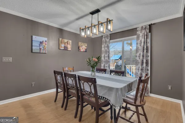 a kitchen with stainless steel appliances granite countertop a stove and a sink