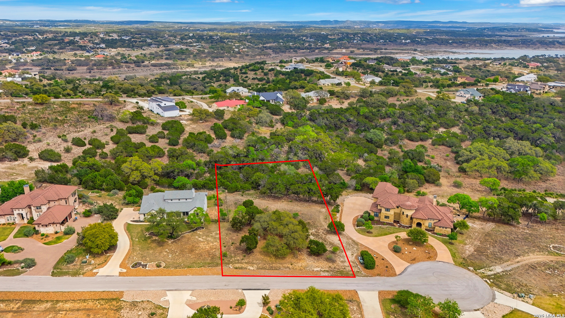 1033 Bluewater Place Spring Branch, TX 78070 - Photo 7 of 25 an aerial view of residential houses with outdoor space