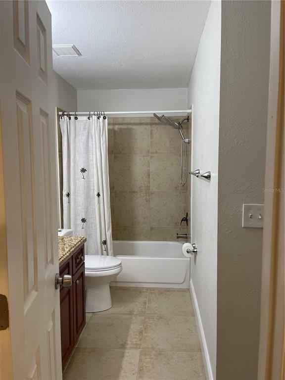 455 Alt 19, Unit 44 Palm Harbor, FL 34683 - Photo 17 of 22 a bathroom with a shower a toilet and a sink