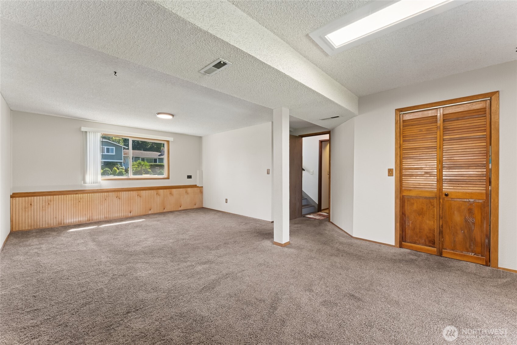2402 Southeast 21st Street Renton, WA 98055 - Photo 17 of 24 an empty room with windows