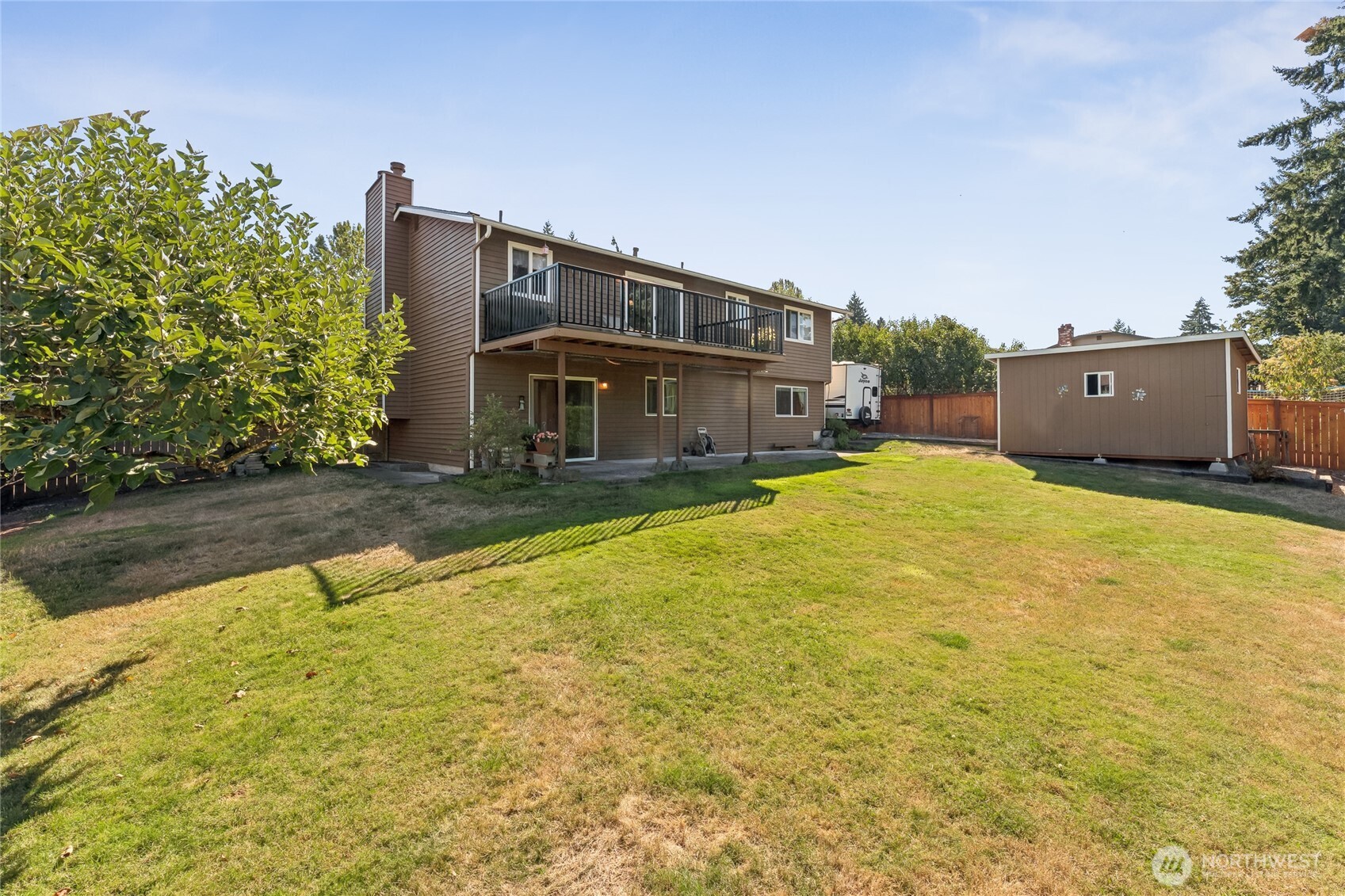 2402 Southeast 21st Street Renton, WA 98055 - Photo 24 of 24 a view of a house with pool and a yard