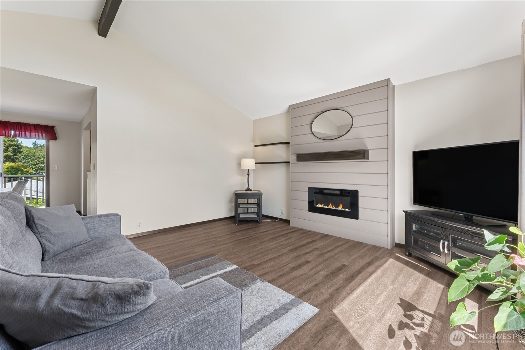 2402 Southeast 21st Street Renton, WA 98055 - Photo 3 of 24 a living room with furniture and a fireplace