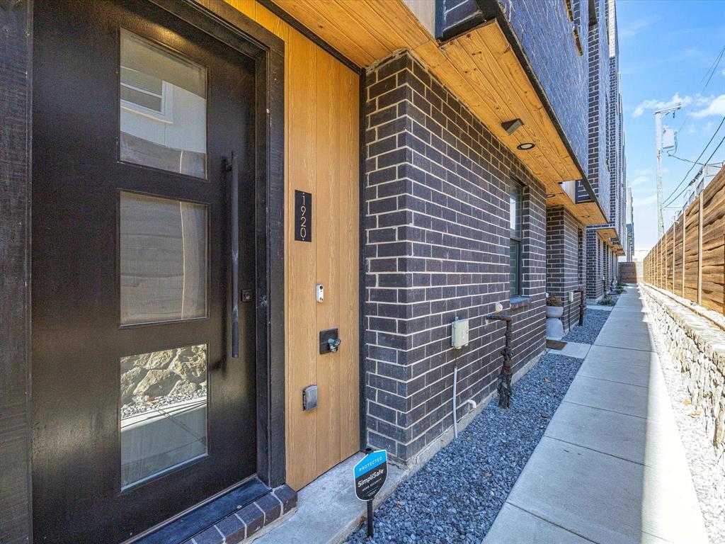 1920 Dowgate Court Dallas, TX 75204 - Photo 1 of 38 Property entrance featuring brick siding