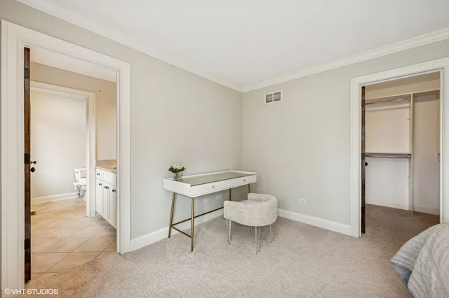 a spacious bathroom with a sink and a toilet