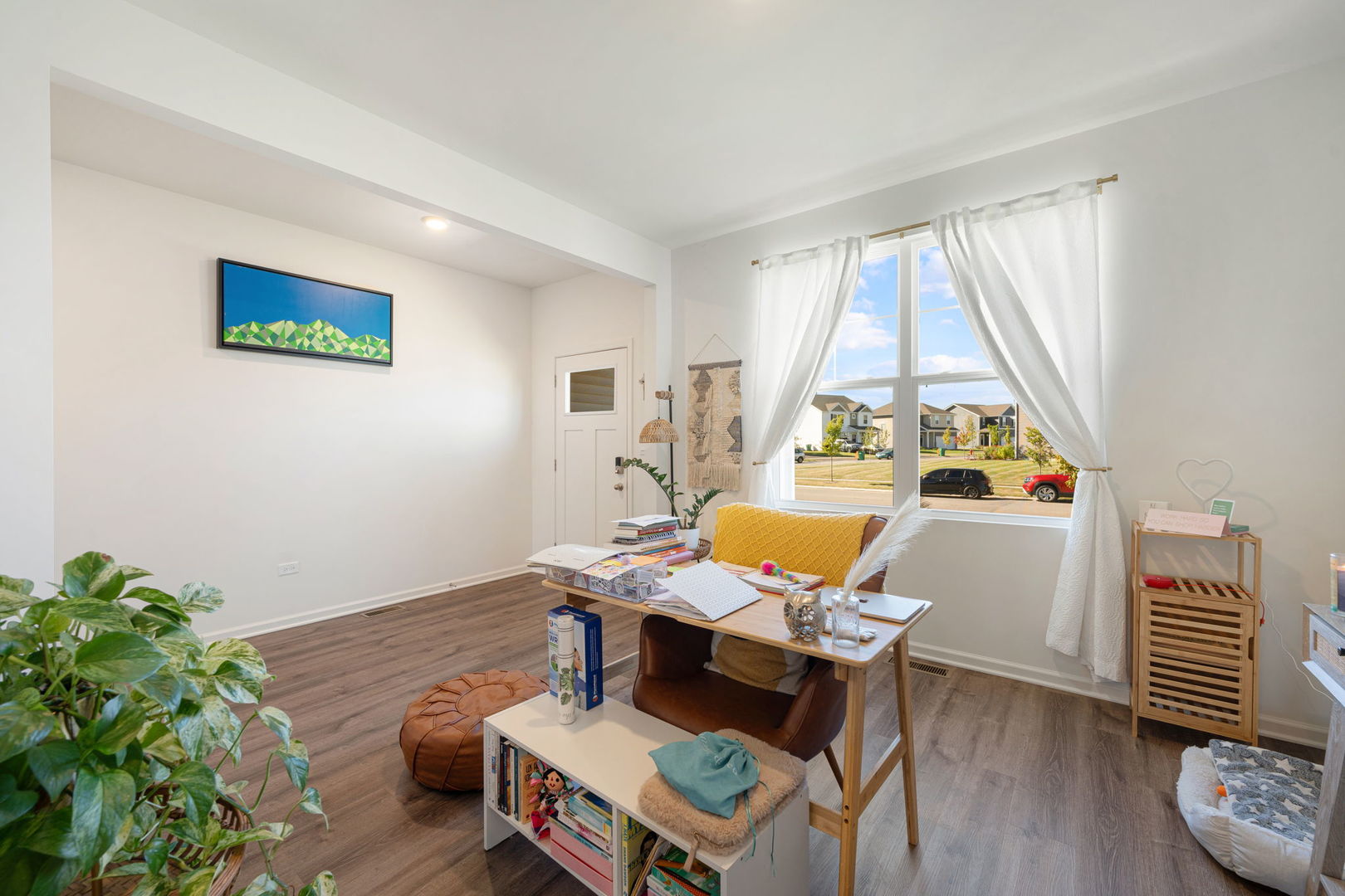 2042 Legacy Pointe Boulevard Plainfield, IL 60586 - Photo 11 of 20 a workspace with furniture and a window