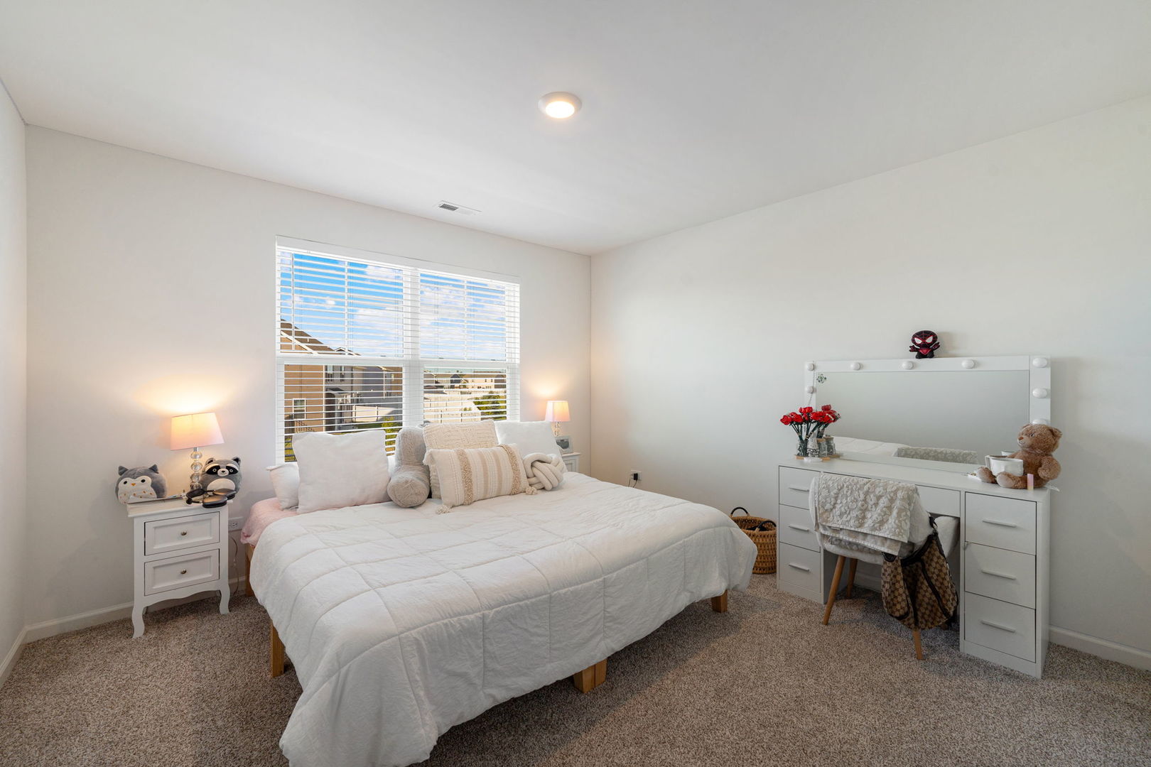 2042 Legacy Pointe Boulevard Plainfield, IL 60586 - Photo 16 of 20 a bedroom with a bed and a window