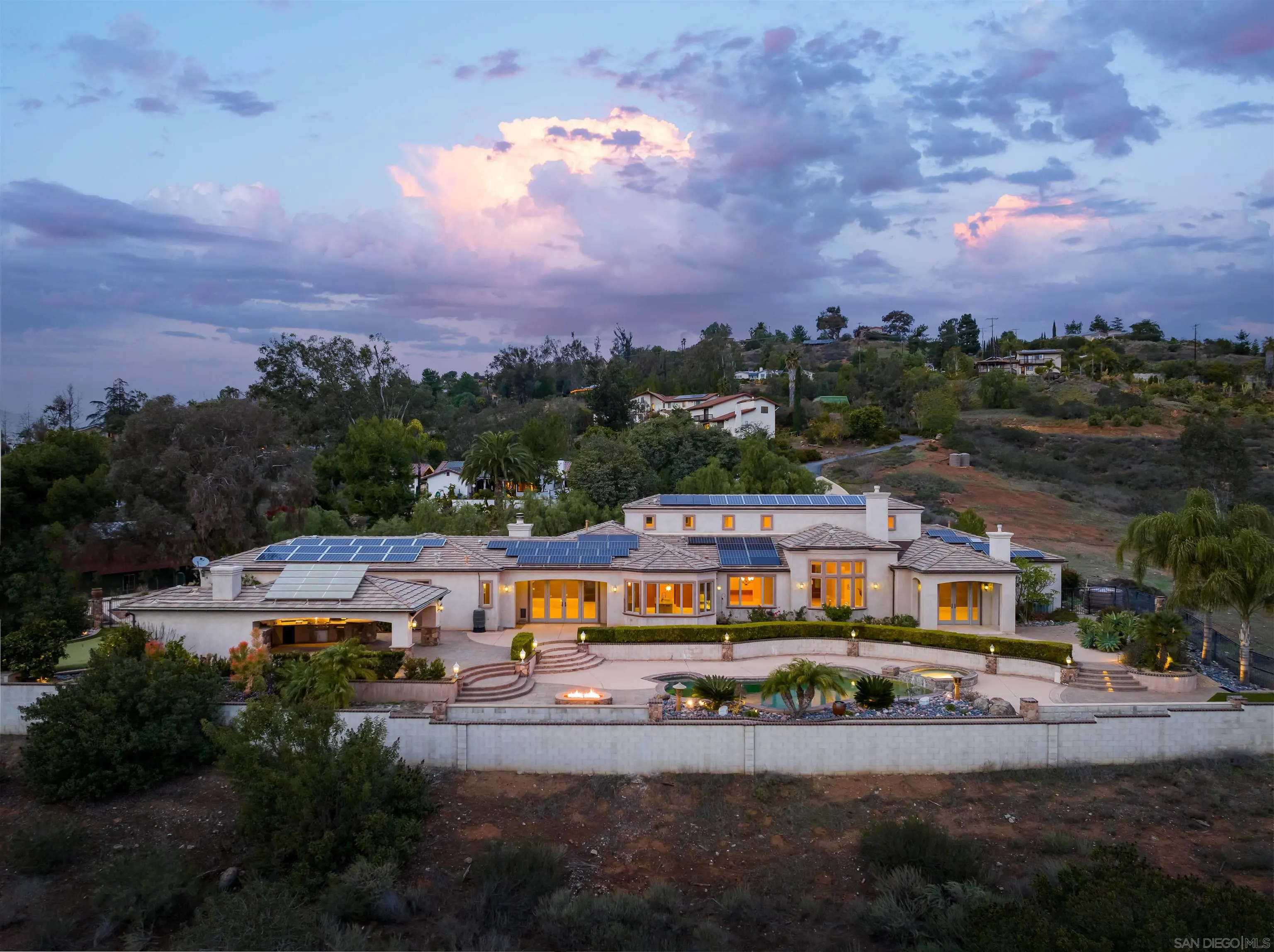 a view of multiple houses with a city street