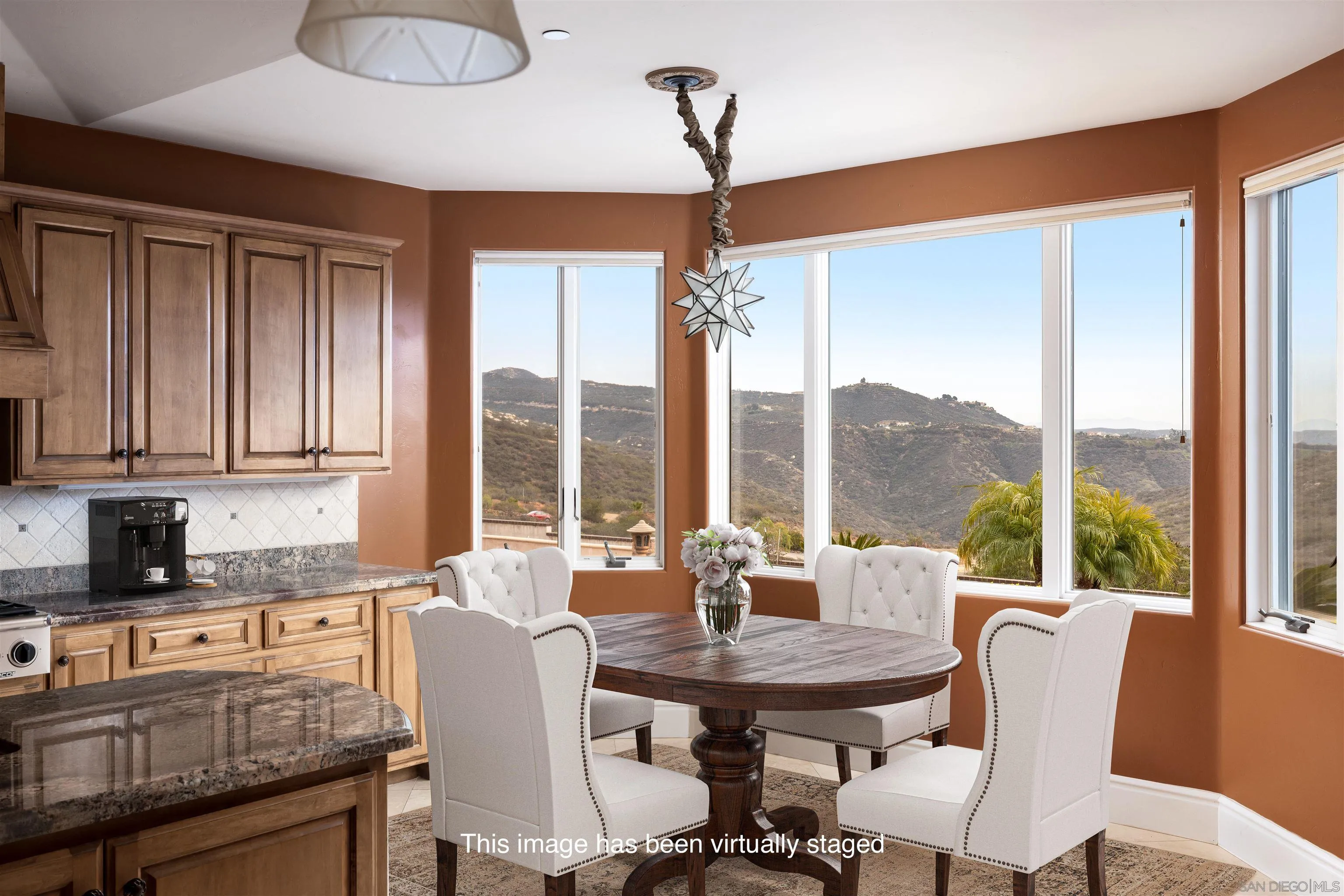 14755 High Valley Road Poway, CA 92064 - Photo 15 of 59 a view of a dining room with furniture windows and wooden floor
