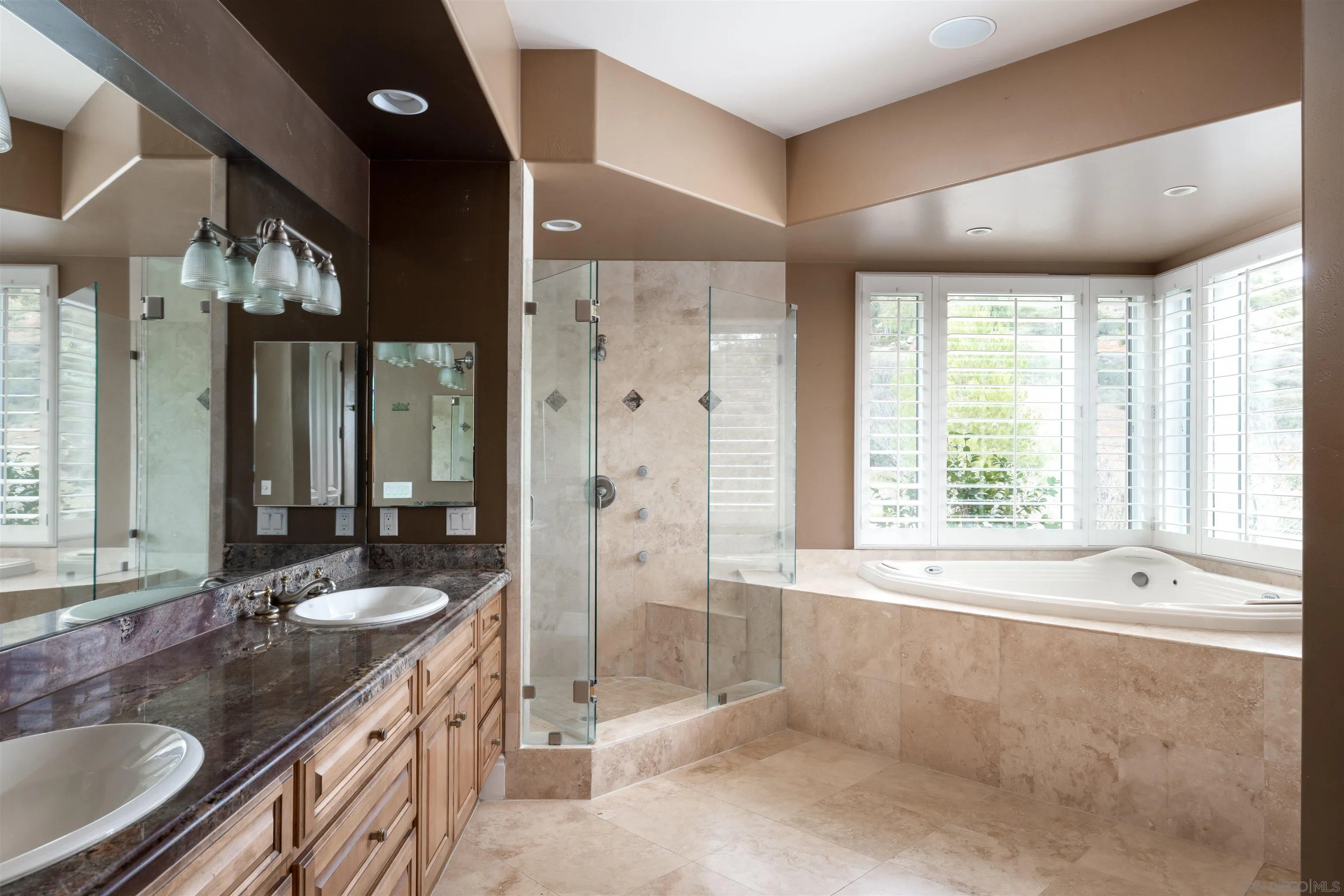 14755 High Valley Road Poway, CA 92064 - Photo 19 of 59 a spacious bathroom with sinks shower and a bathtub
