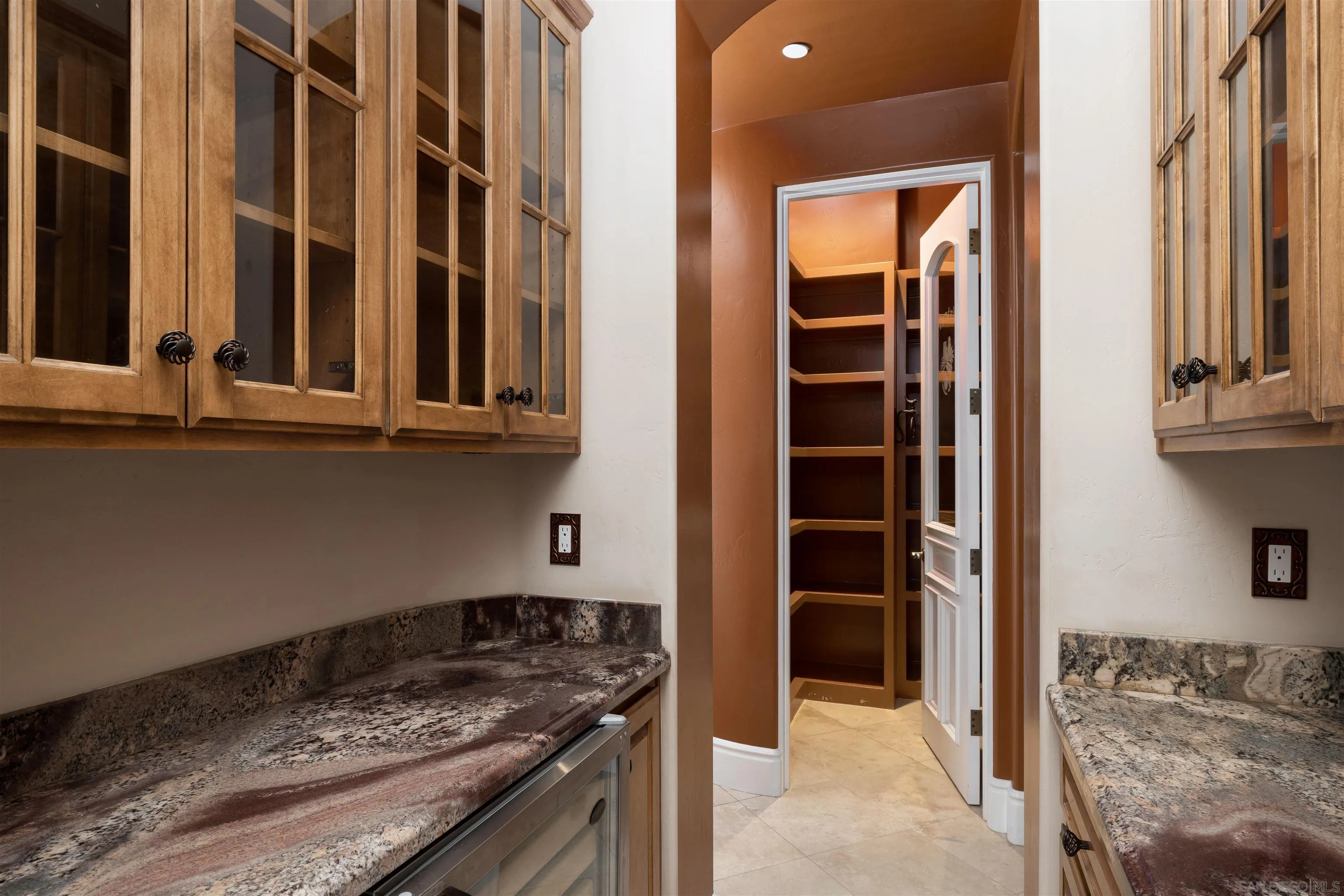 14755 High Valley Road Poway, CA 92064 - Photo 22 of 59 a kitchen with a stove and a cabinet