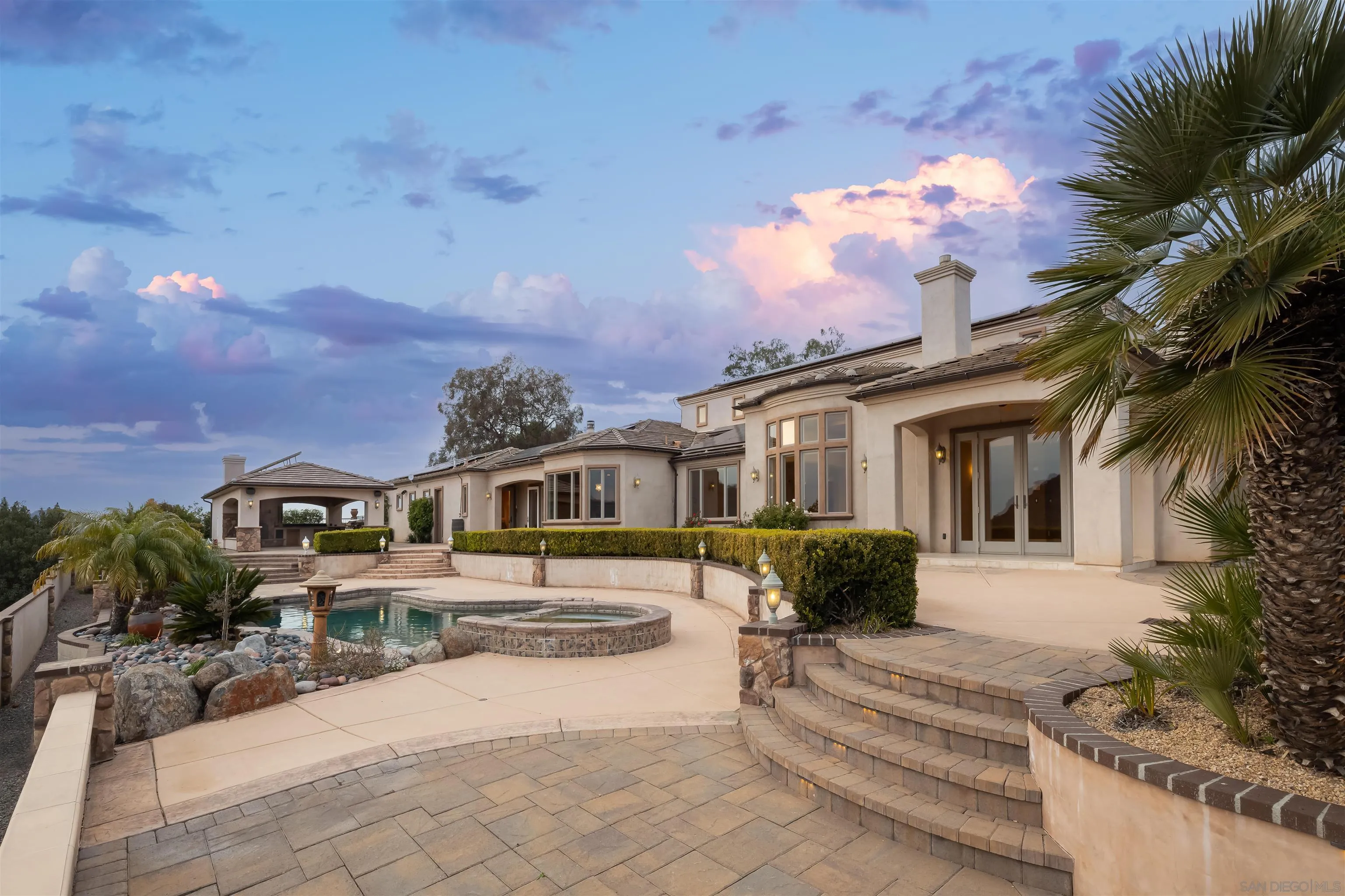 14755 High Valley Road Poway, CA 92064 - Photo 35 of 59 a front view of a house with a garden