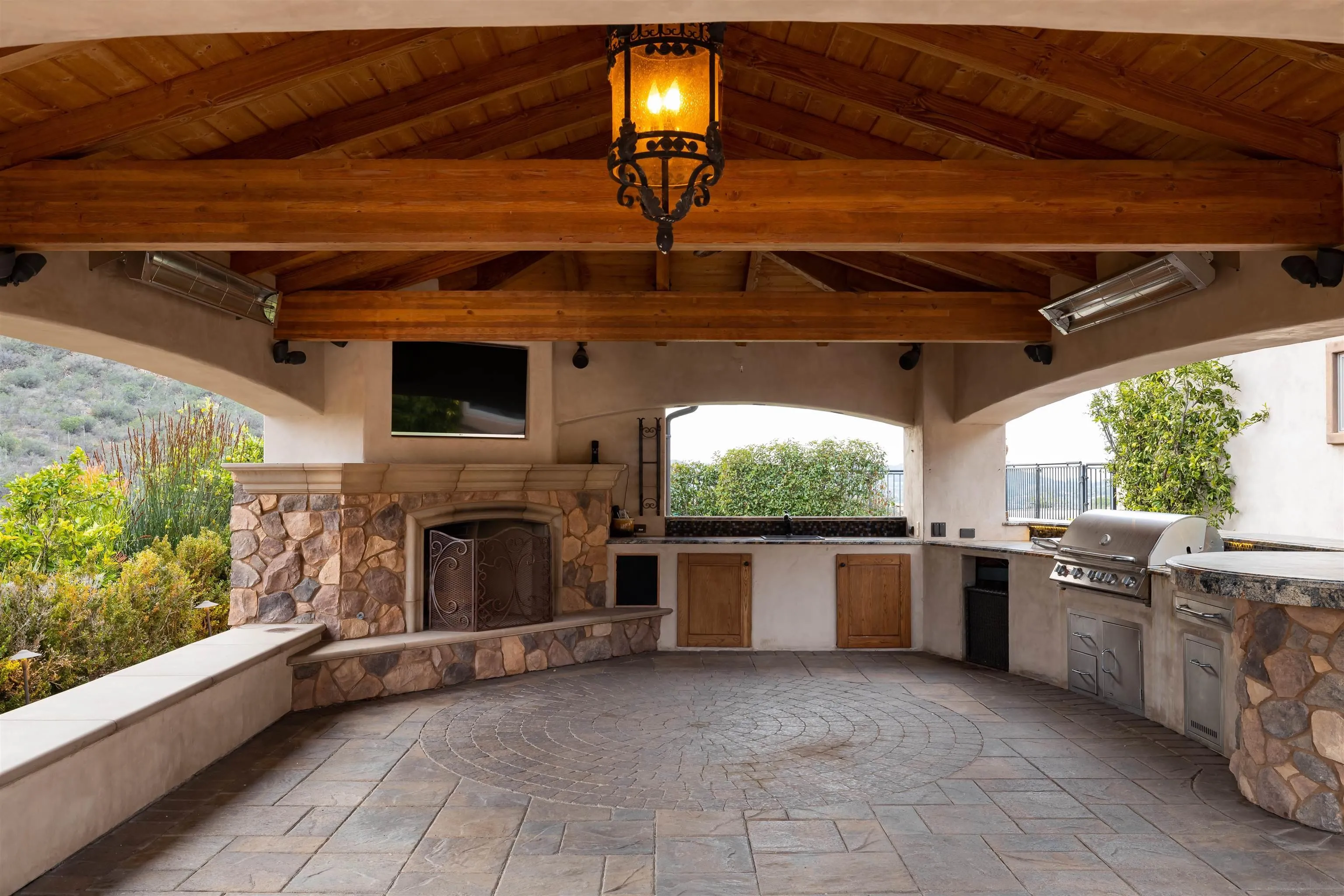 14755 High Valley Road Poway, CA 92064 - Photo 41 of 59 a view of a kitchen with a sink and a stove