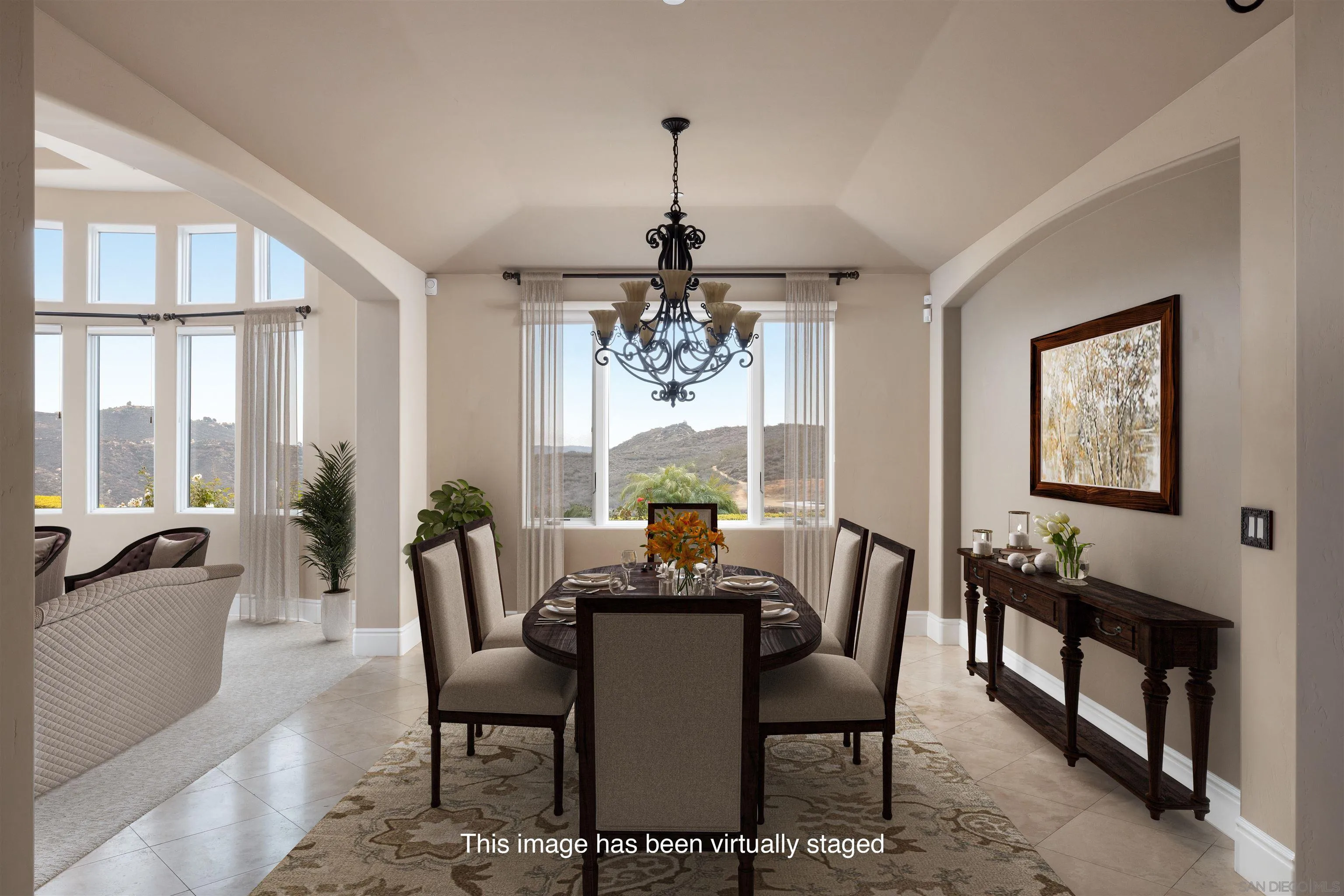 14755 High Valley Road Poway, CA 92064 - Photo 8 of 59 a dining room with furniture a chandelier and wooden floor