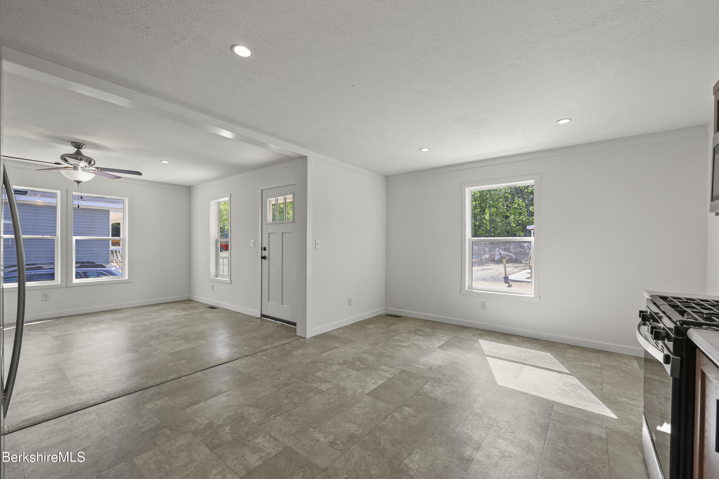 395 Cheshire Road, Unit 102 Pittsfield, MA 01201 - Photo 14 of 28 a view of an empty room with a window