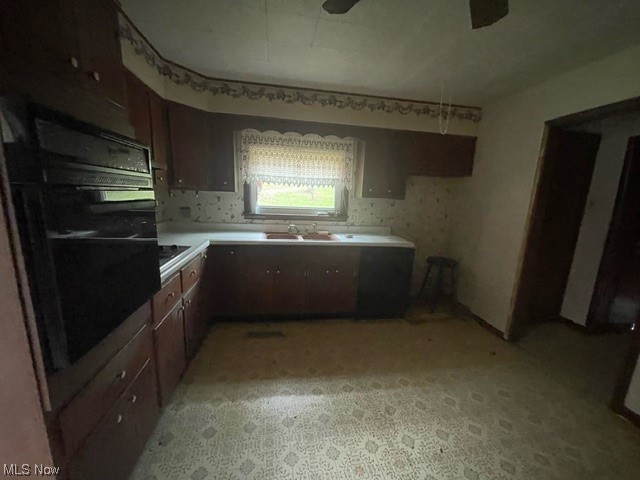 52279 Bares Run Road Hannibal, OH 43931 - Photo 4 of 17 Kitchen featuring black appliances, dark brown cabinets, and sink
