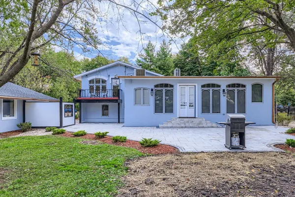 front view of a house with a yard