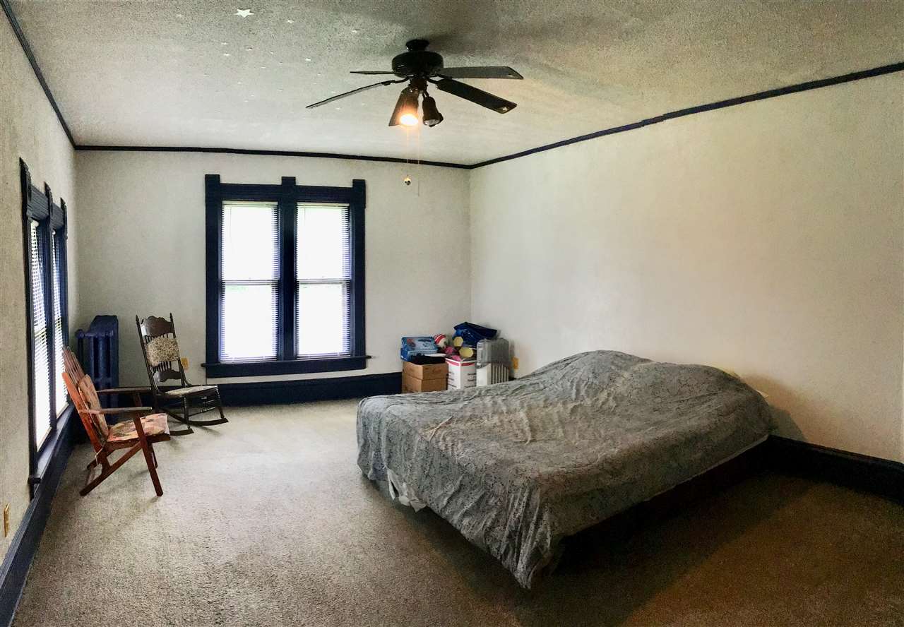 504 West Cunningham Road Winnebago, IL 61088 - Photo 13 of 25 a bedroom with bed and a window