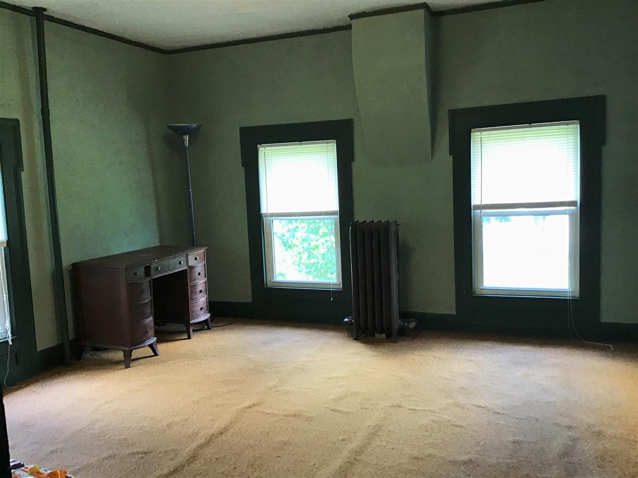 504 West Cunningham Road Winnebago, IL 61088 - Photo 15 of 25 an empty room with a window