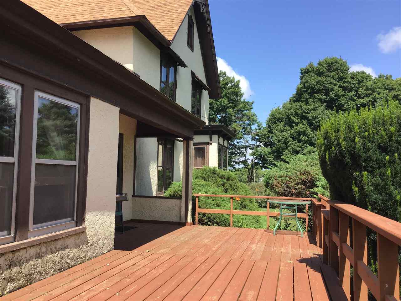 504 West Cunningham Road Winnebago, IL 61088 - Photo 23 of 25 a balcony with wooden floor and outdoor space