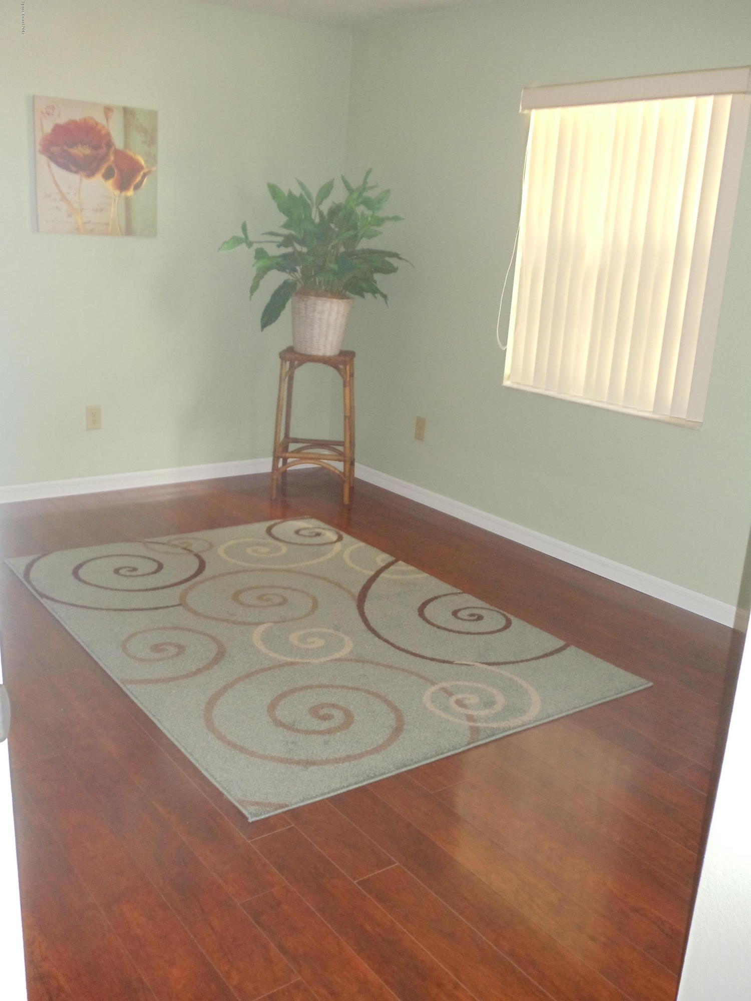 271 Trilby Road Southwest Palm Bay, FL 32908 - Photo 20 of 27 a view of a livingroom with furniture and a window