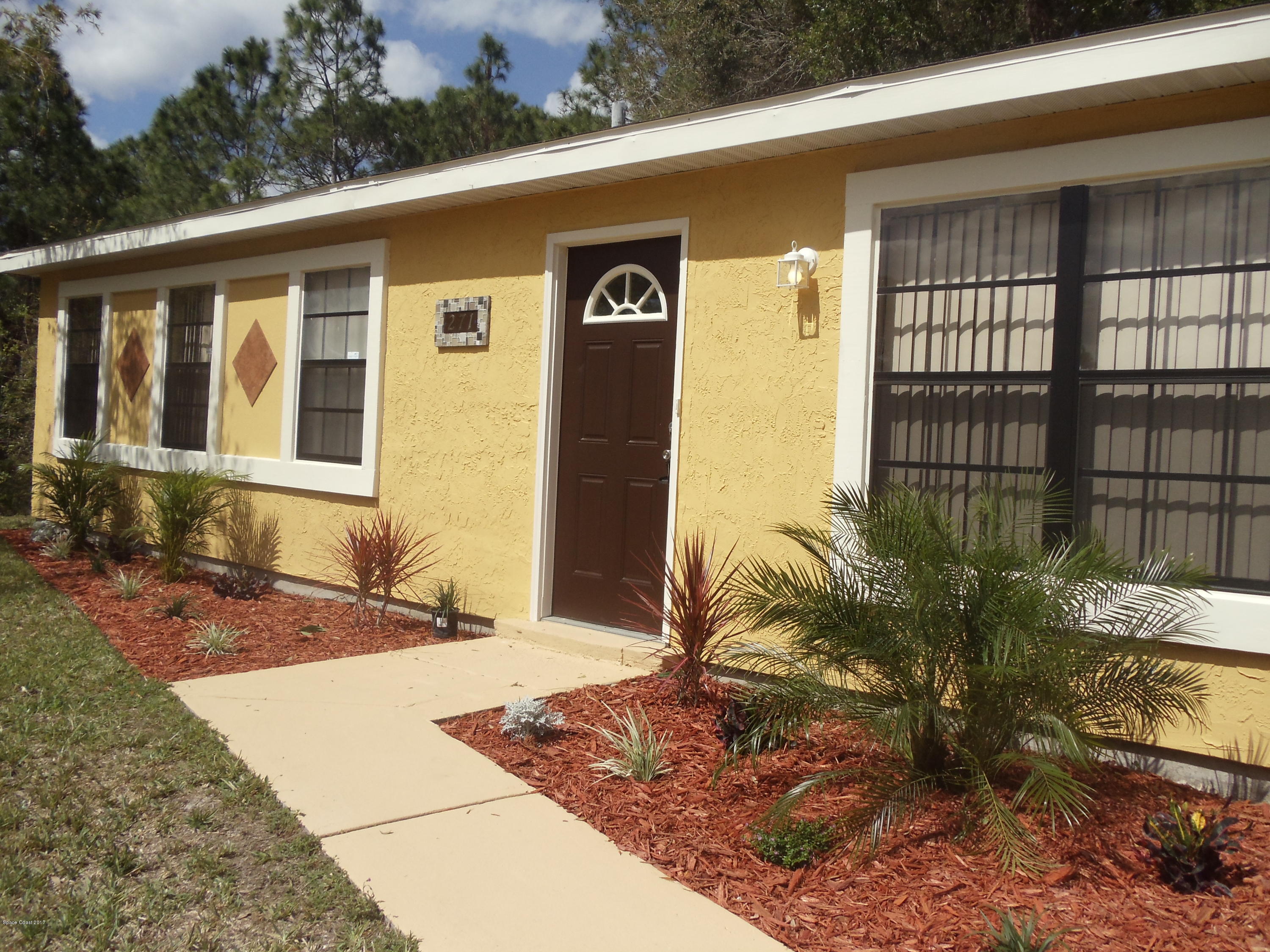 271 Trilby Road Southwest Palm Bay, FL 32908 - Photo 27 of 27 a front view of a house