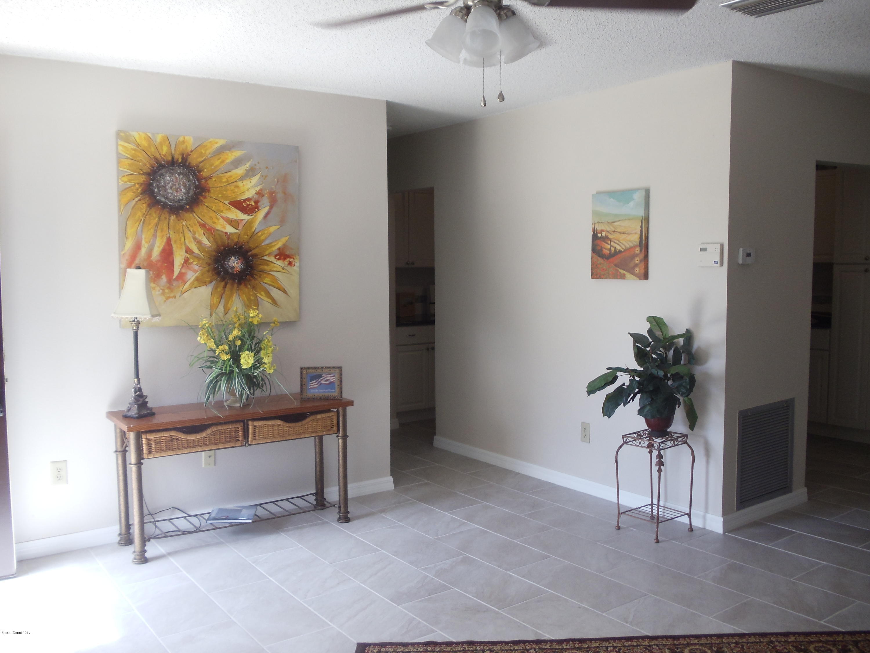271 Trilby Road Southwest Palm Bay, FL 32908 - Photo 6 of 27 a living room with furniture