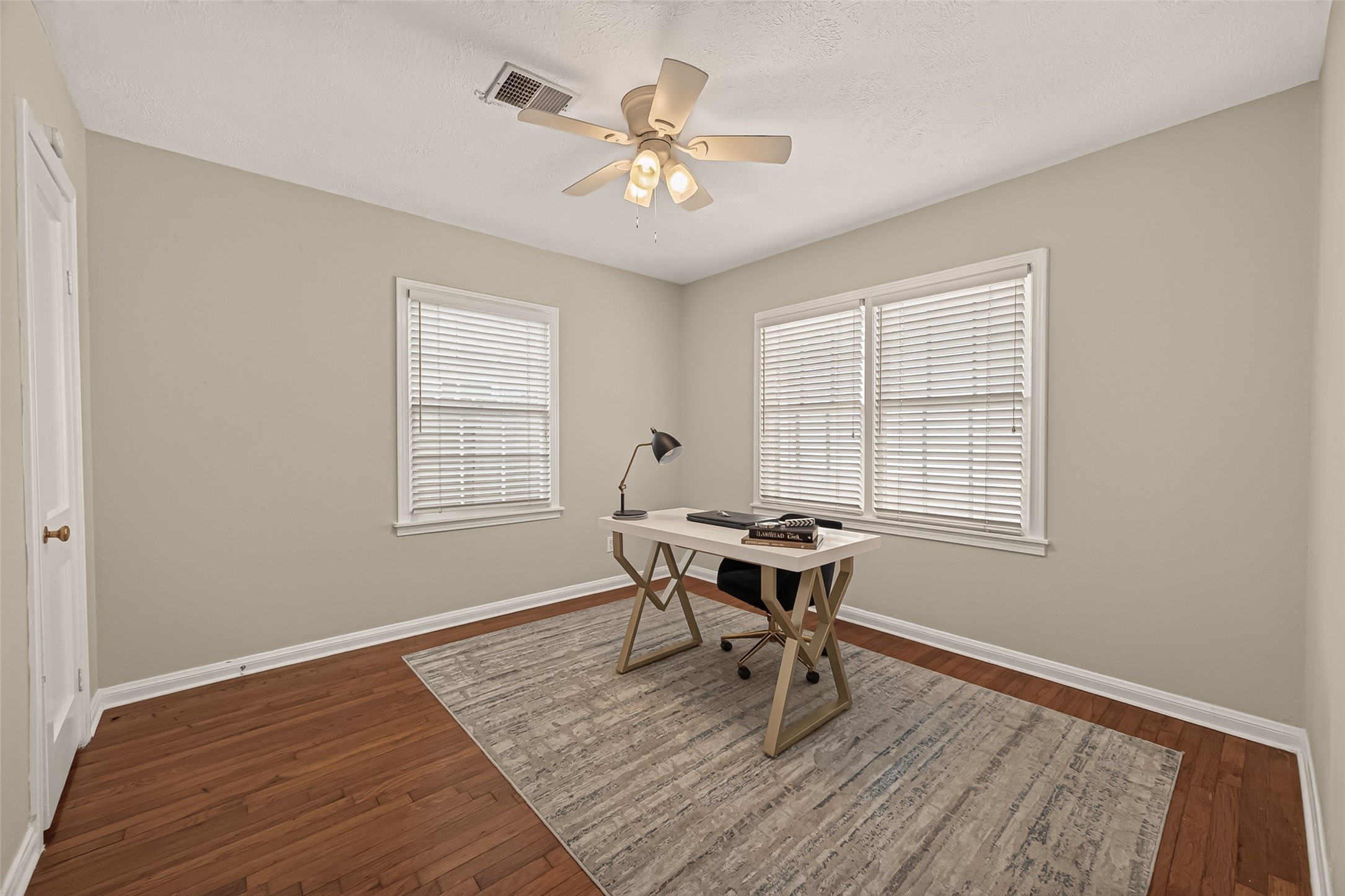 2019 Gostick Street Houston, TX 77008 - Photo 22 of 36 a workspace with wooden floor