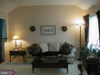 219 Media Line Road Broomall, PA 19008 - Photo 4 of 6 a living room with furniture and a lamp