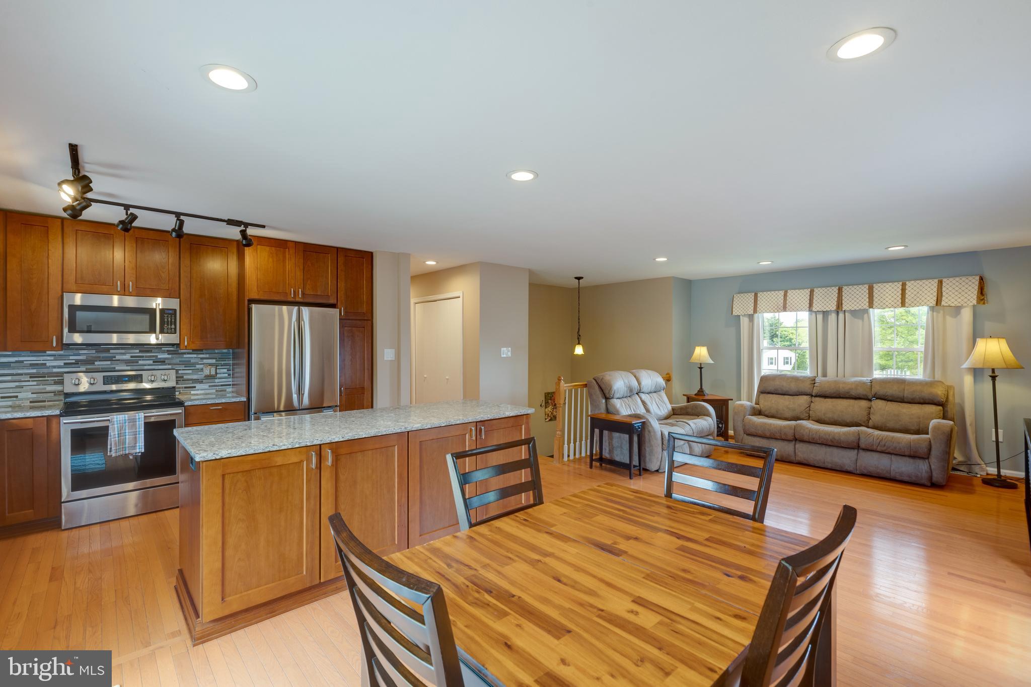 1344 Shallow Ford Road Herndon, VA 20170 - Photo 13 of 50 Great flow from kitchen, dining area to living rm